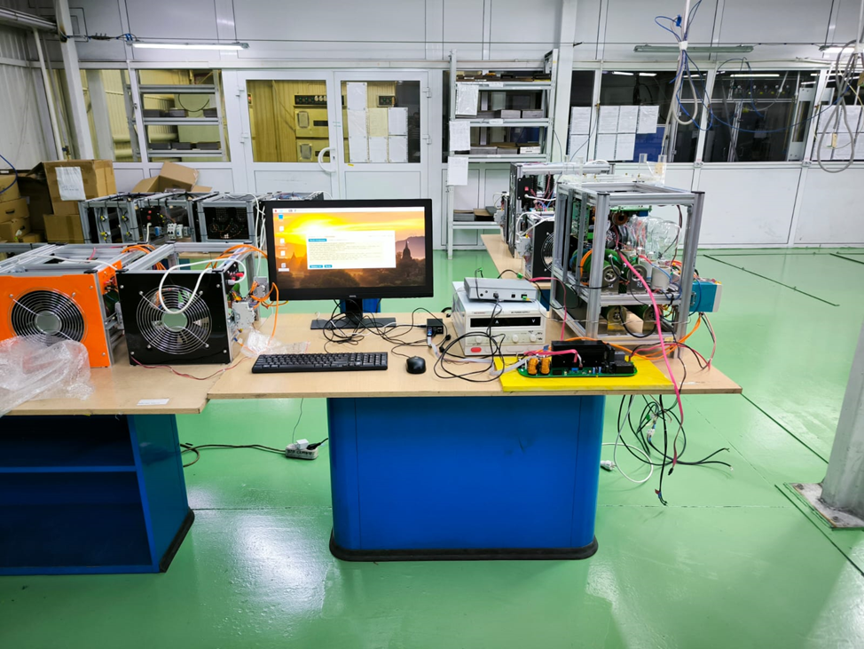 A computer on a table
Description automatically generated